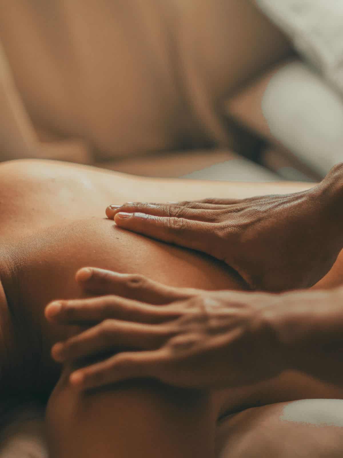 Hands giving a women a massage