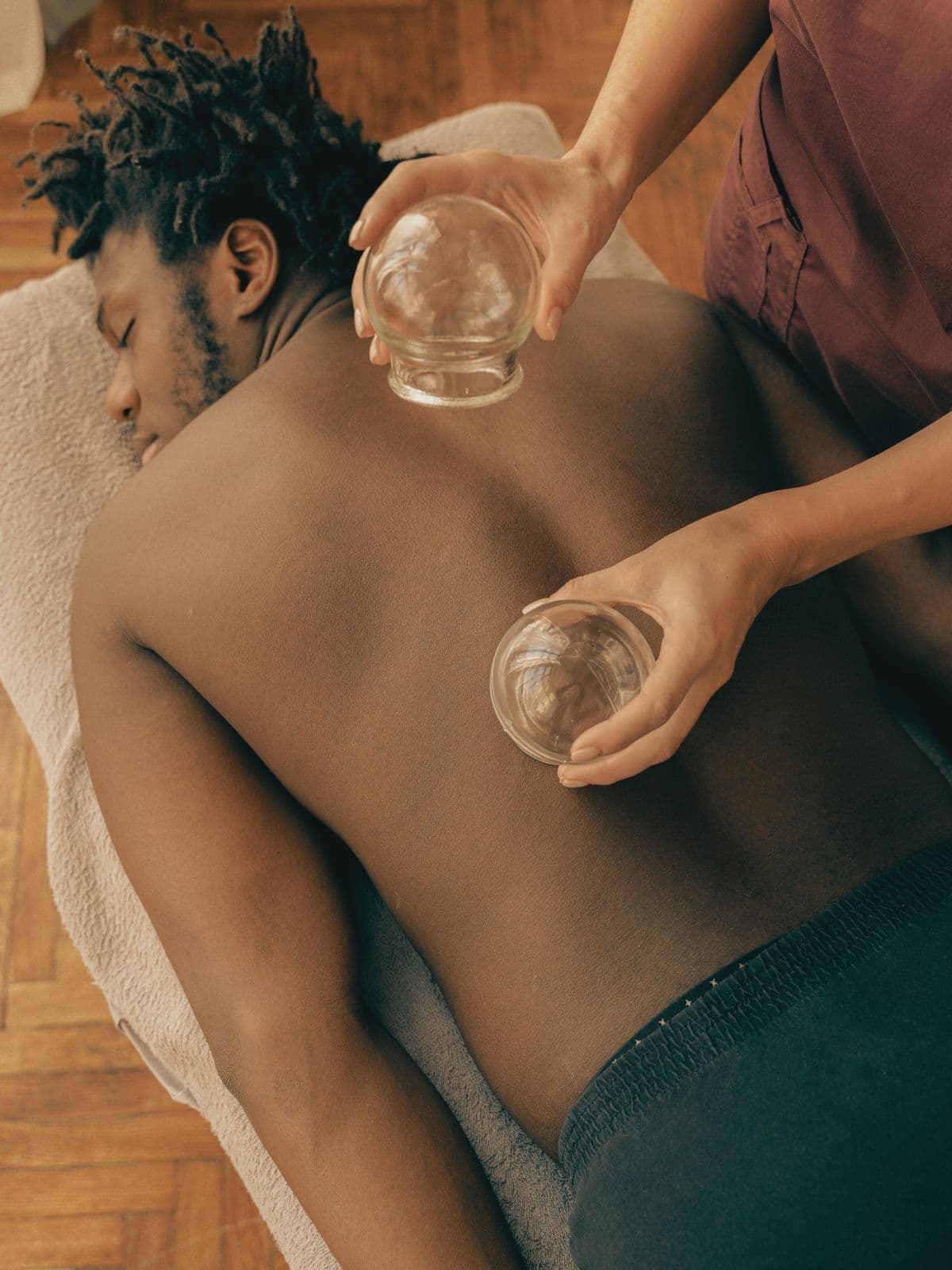 Man receiving a cupping massage